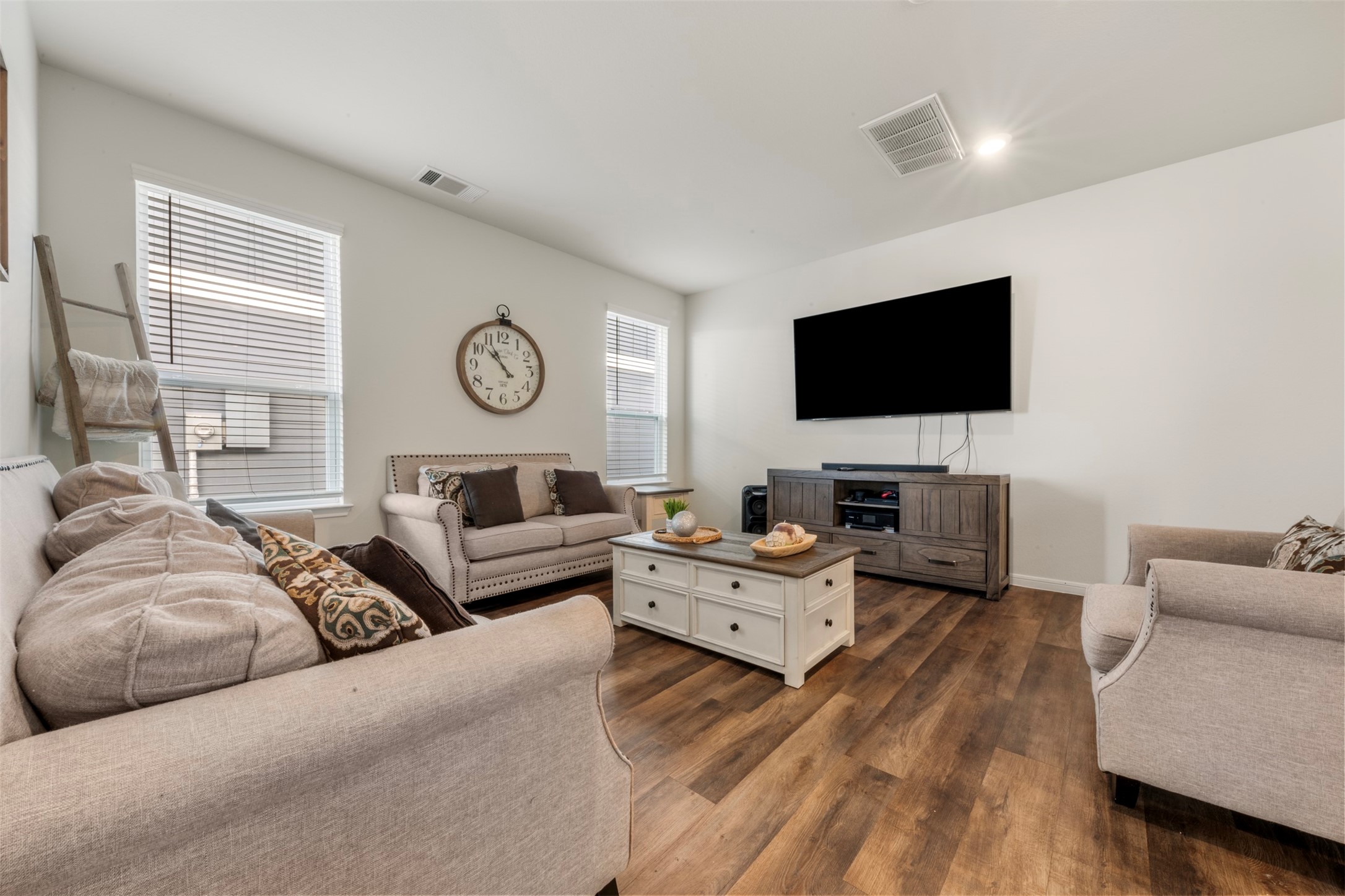 4611 Prairie Chase Drive Houston, TX 77069 - Photo 5 of 44 a living room with furniture and a flat screen tv