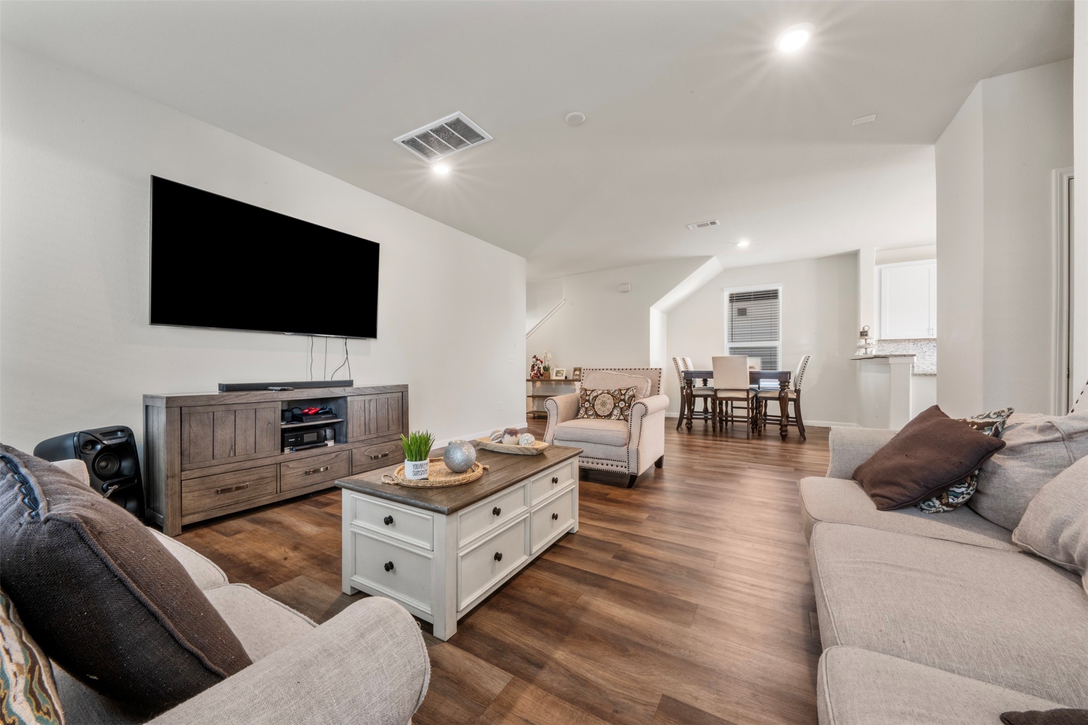 4611 Prairie Chase Drive Houston, TX 77069 - Photo 6 of 44 a living room with furniture and a flat screen tv