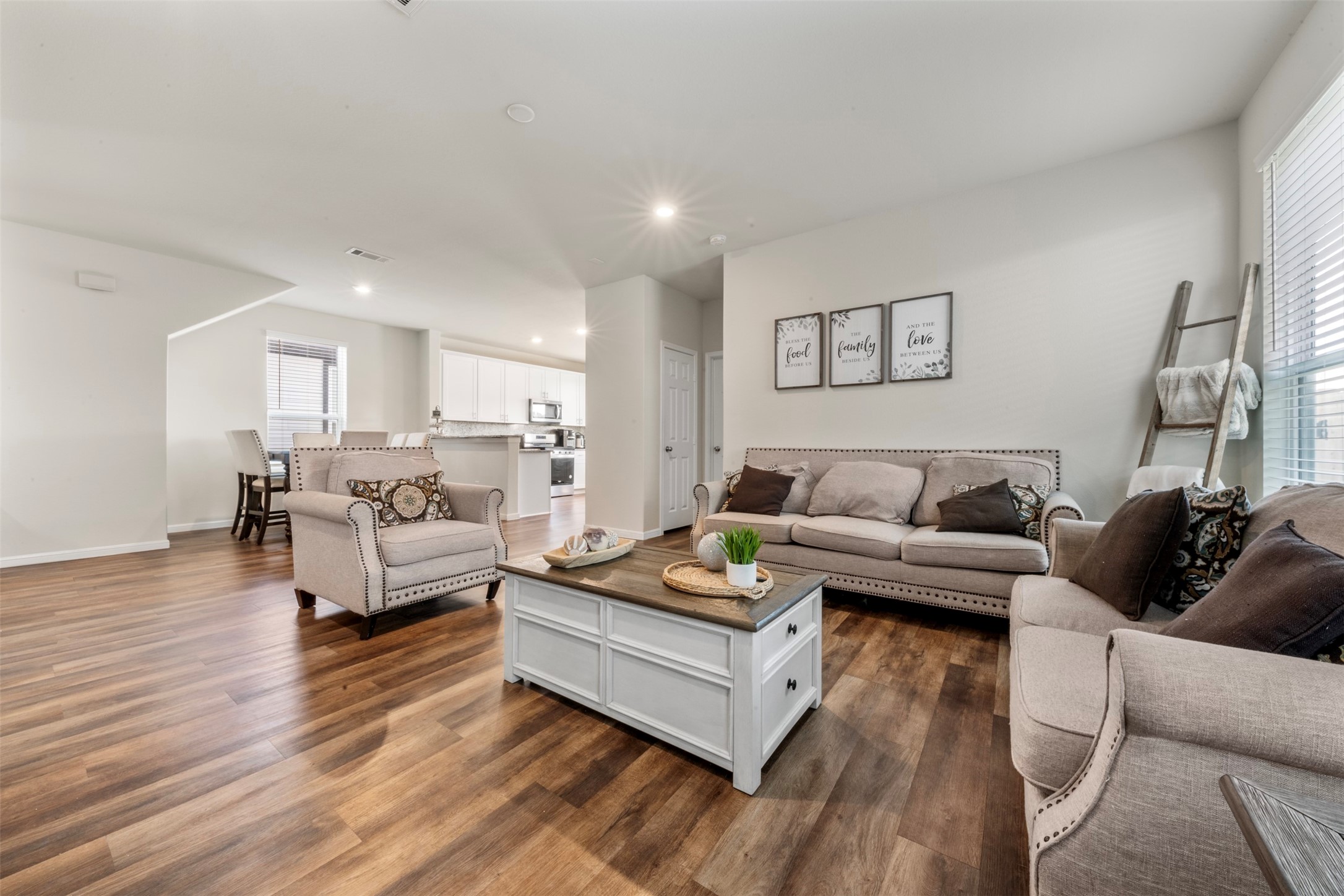 4611 Prairie Chase Drive Houston, TX 77069 - Photo 7 of 44 a living room with furniture and a wooden floor