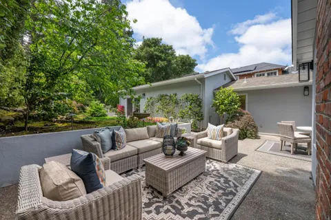 a building outdoor space with patio furniture