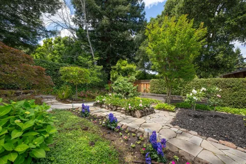 a backyard of a house with lots of green space