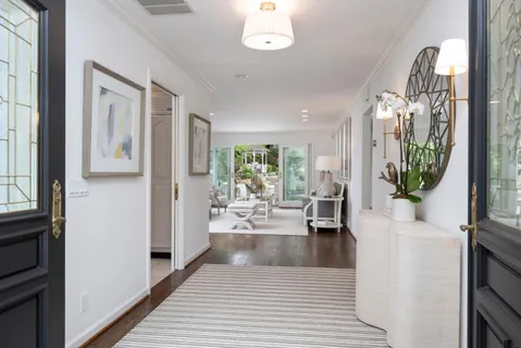 a very nice looking living room with wooden floor