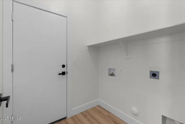 a view of small space with wooden floor