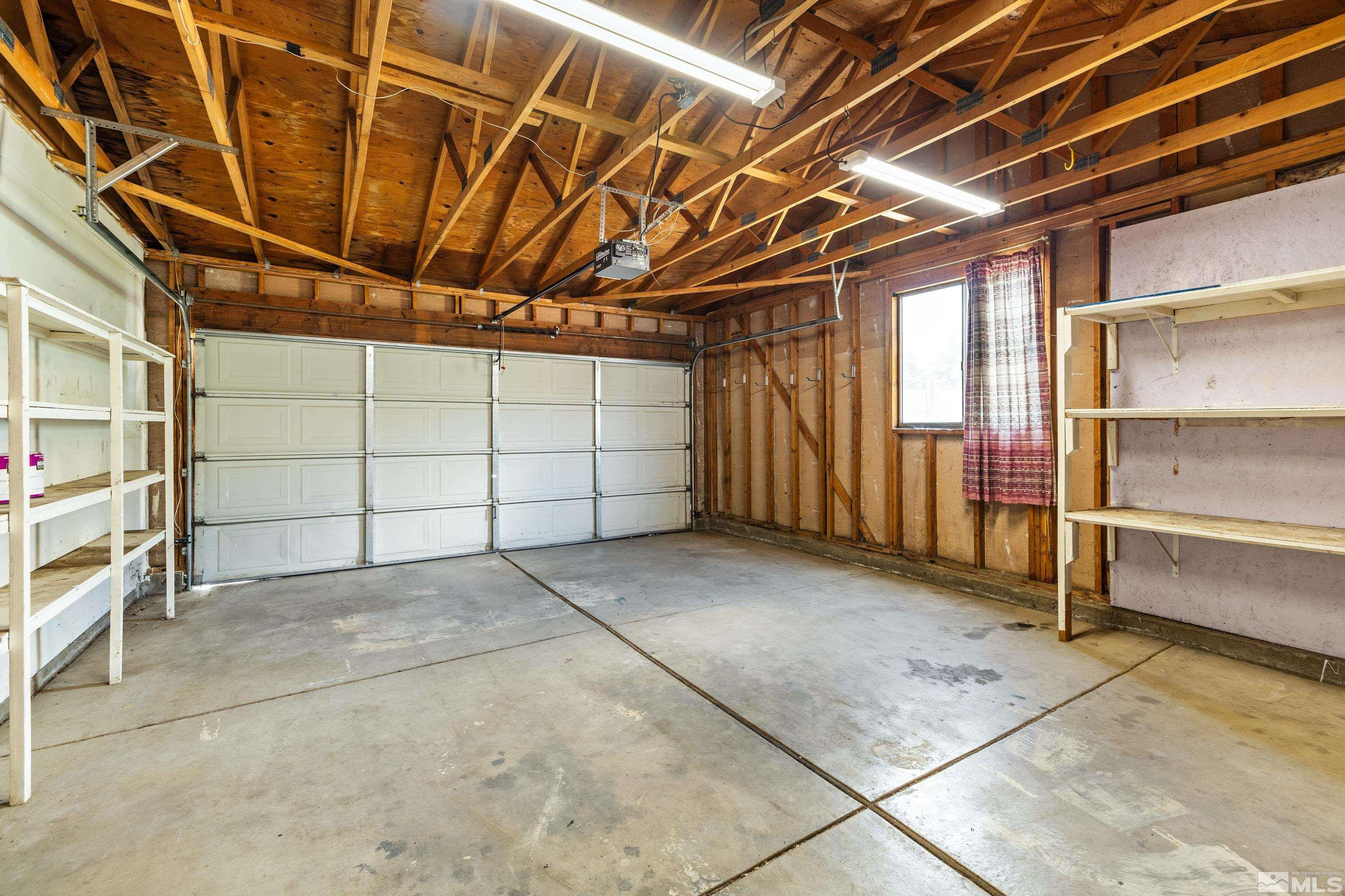 6827 Flower Street Reno, NV 89506 - Photo 21 of 31 a view of a room with wooden racks