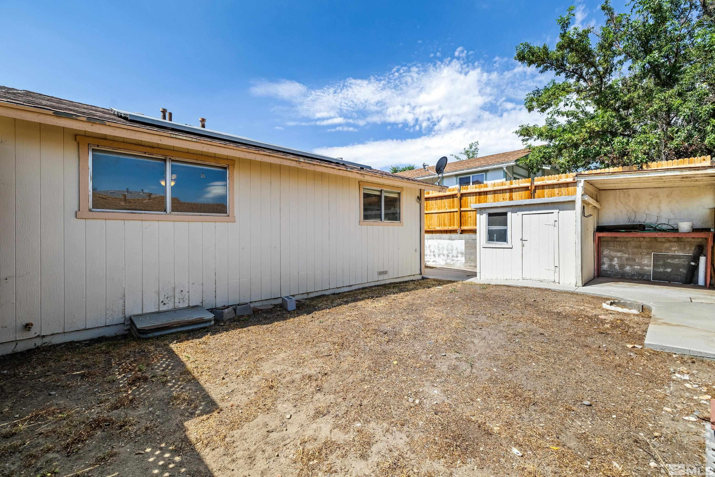 6827 Flower Street Reno, NV 89506 - Photo 8 of 31 a backyard of a house