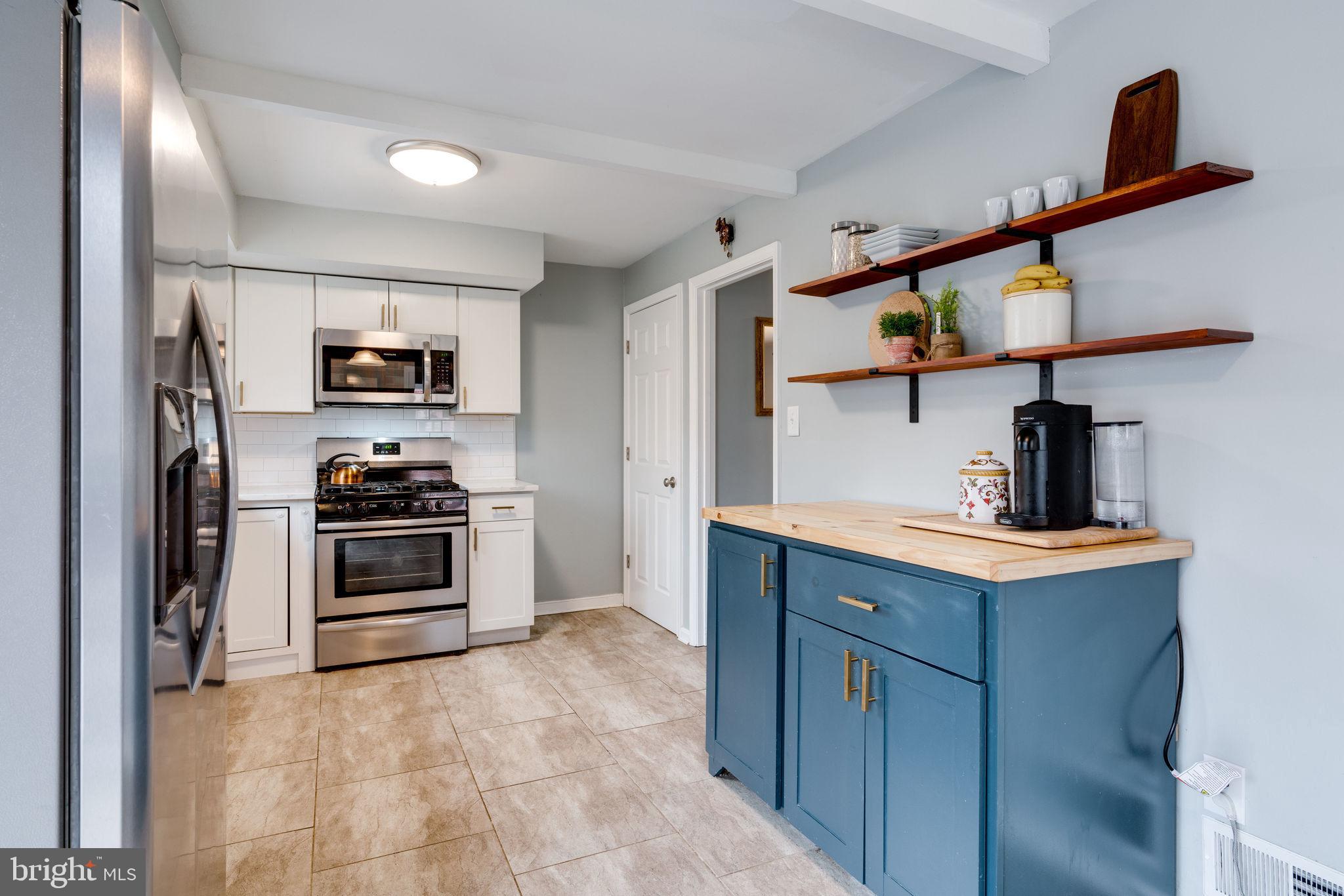 6810 Huntsman Boulevard Springfield, VA 22152 - Photo 21 of 73 Newer stainless steel appliances and cabinets