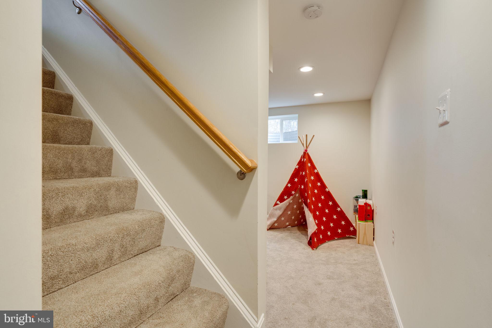6810 Huntsman Boulevard Springfield, VA 22152 - Photo 53 of 73 lower level rec room