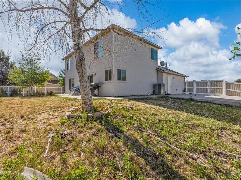 2860 B B 3/4 Road Grand Junction, CO 81503 - Photo 29 of 29 a house view with a yard