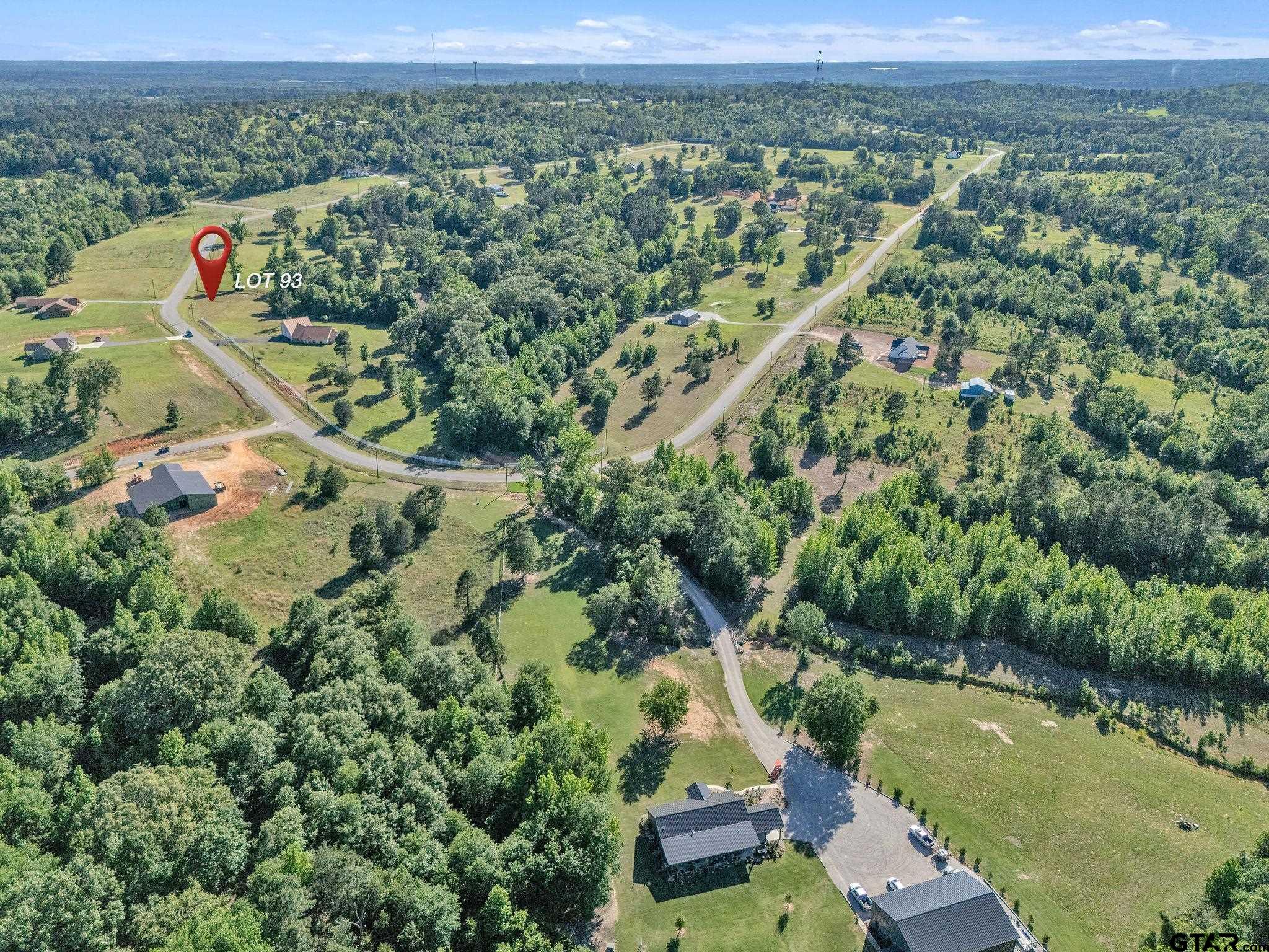 16808 Ridgeline Loop Winona, TX 75792 - Photo 5 of 12 an aerial view of residential houses with outdoor space and river