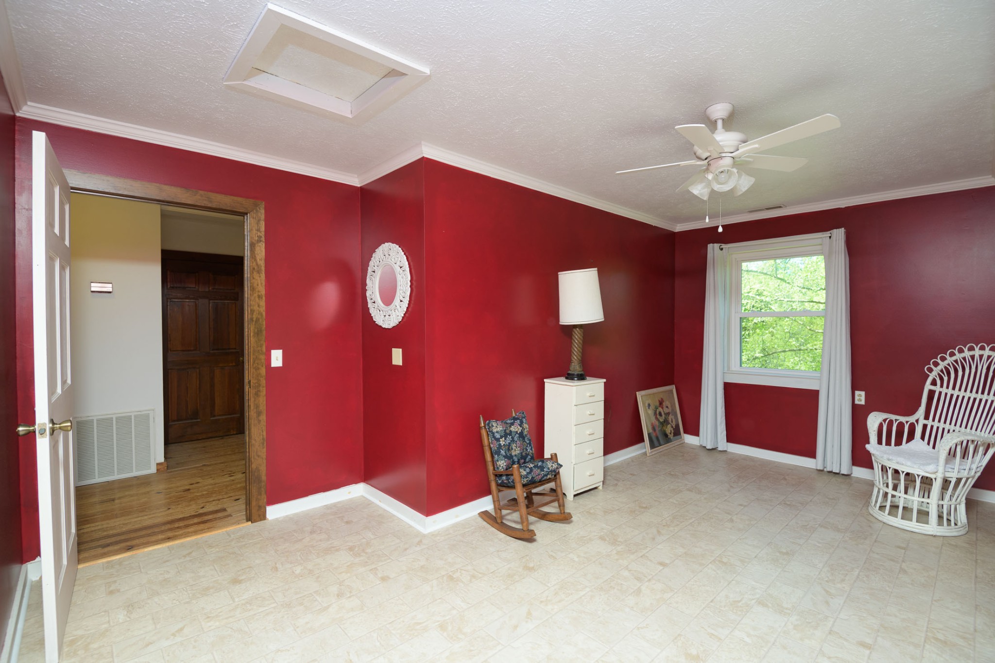 4496 Lower Helton Road Alexandria, TN 37012 - Photo 13 of 40 an empty room with windows and ceiling fan