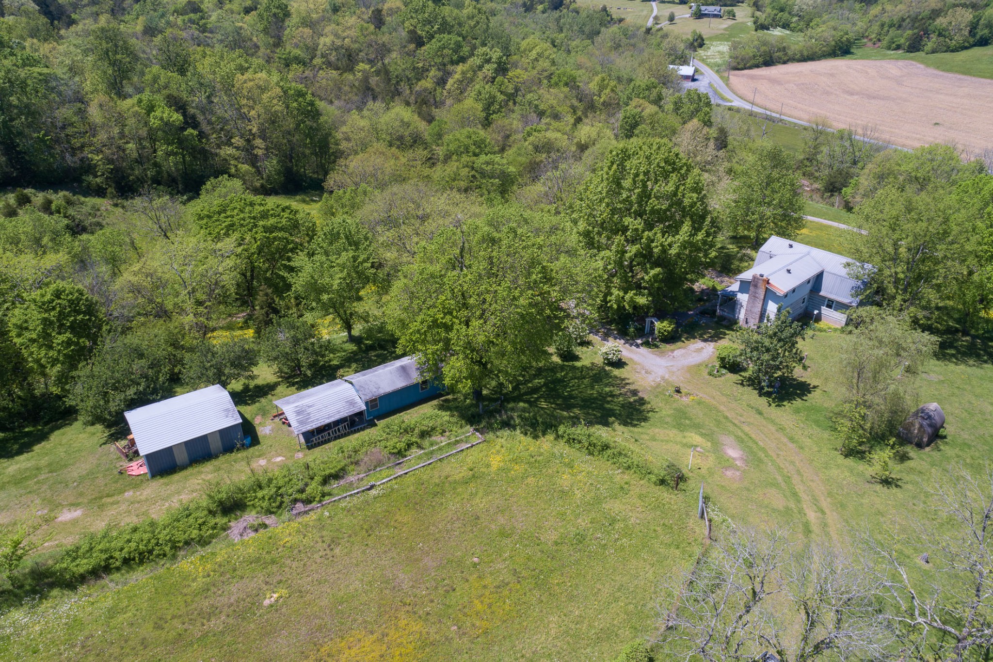 4496 Lower Helton Road Alexandria, TN 37012 - Photo 19 of 40 a view of a house with a yard
