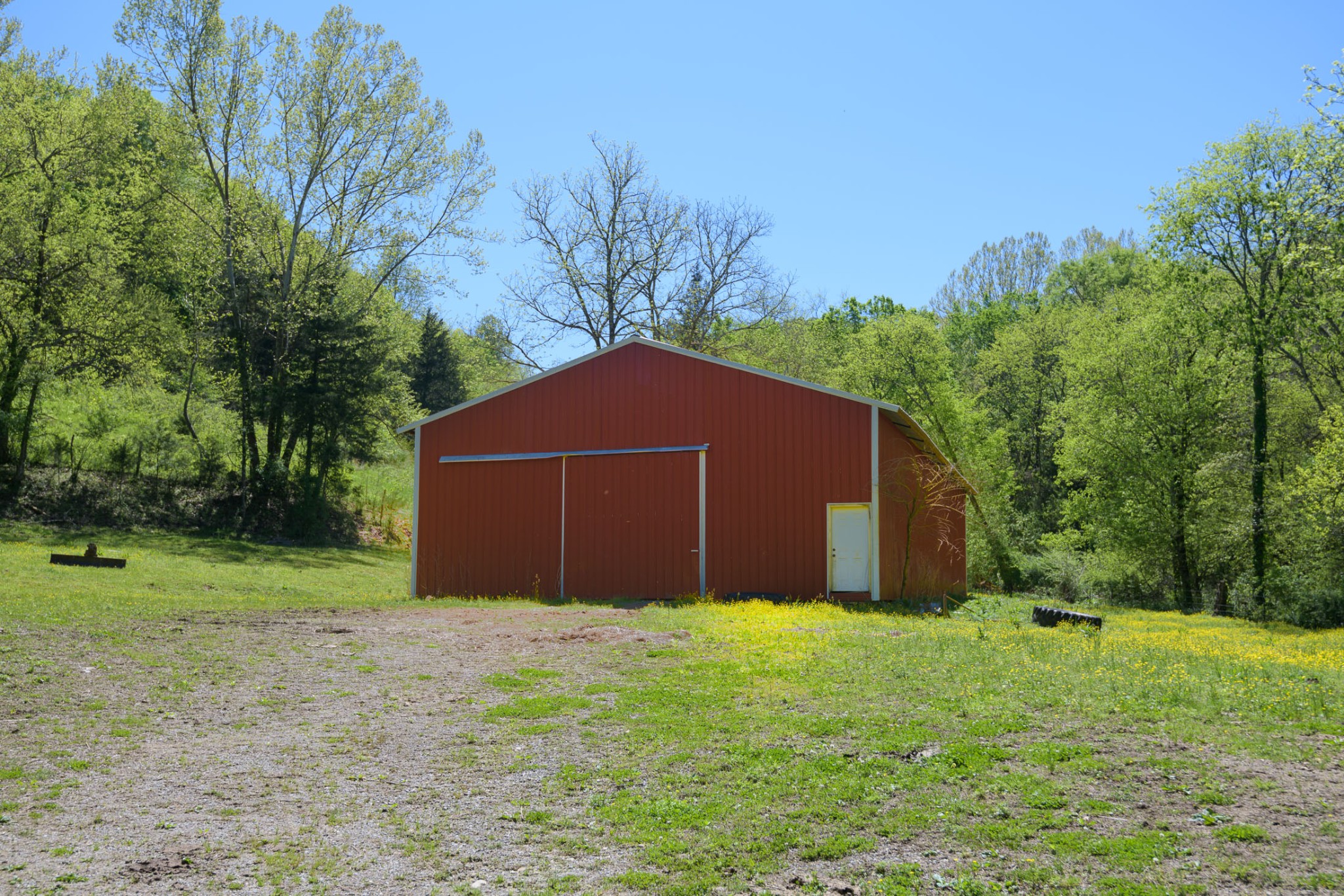 4496 Lower Helton Road Alexandria, TN 37012 - Photo 22 of 40 a front view of house with yard and trees