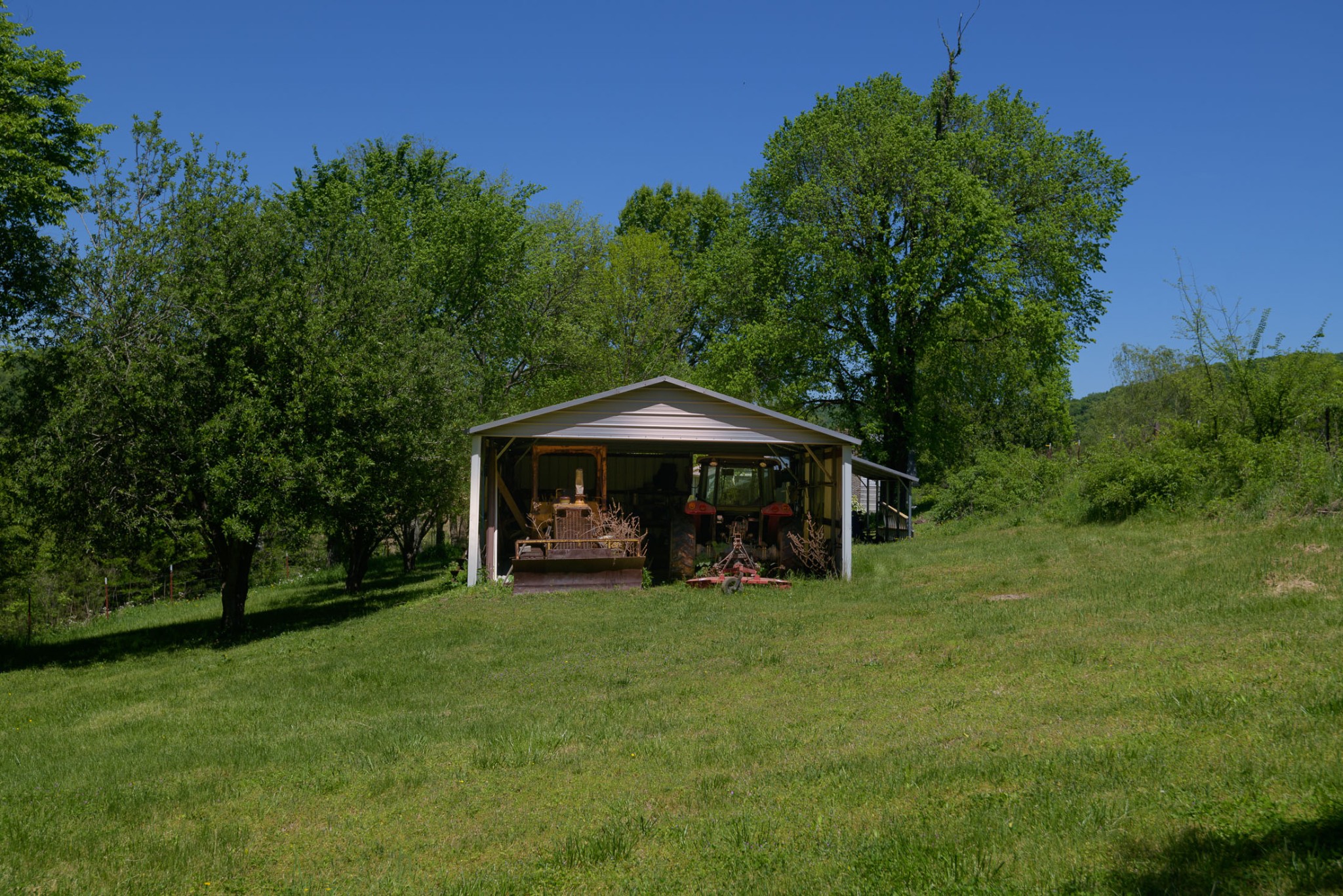 4496 Lower Helton Road Alexandria, TN 37012 - Photo 23 of 40 a view of a house with a yard