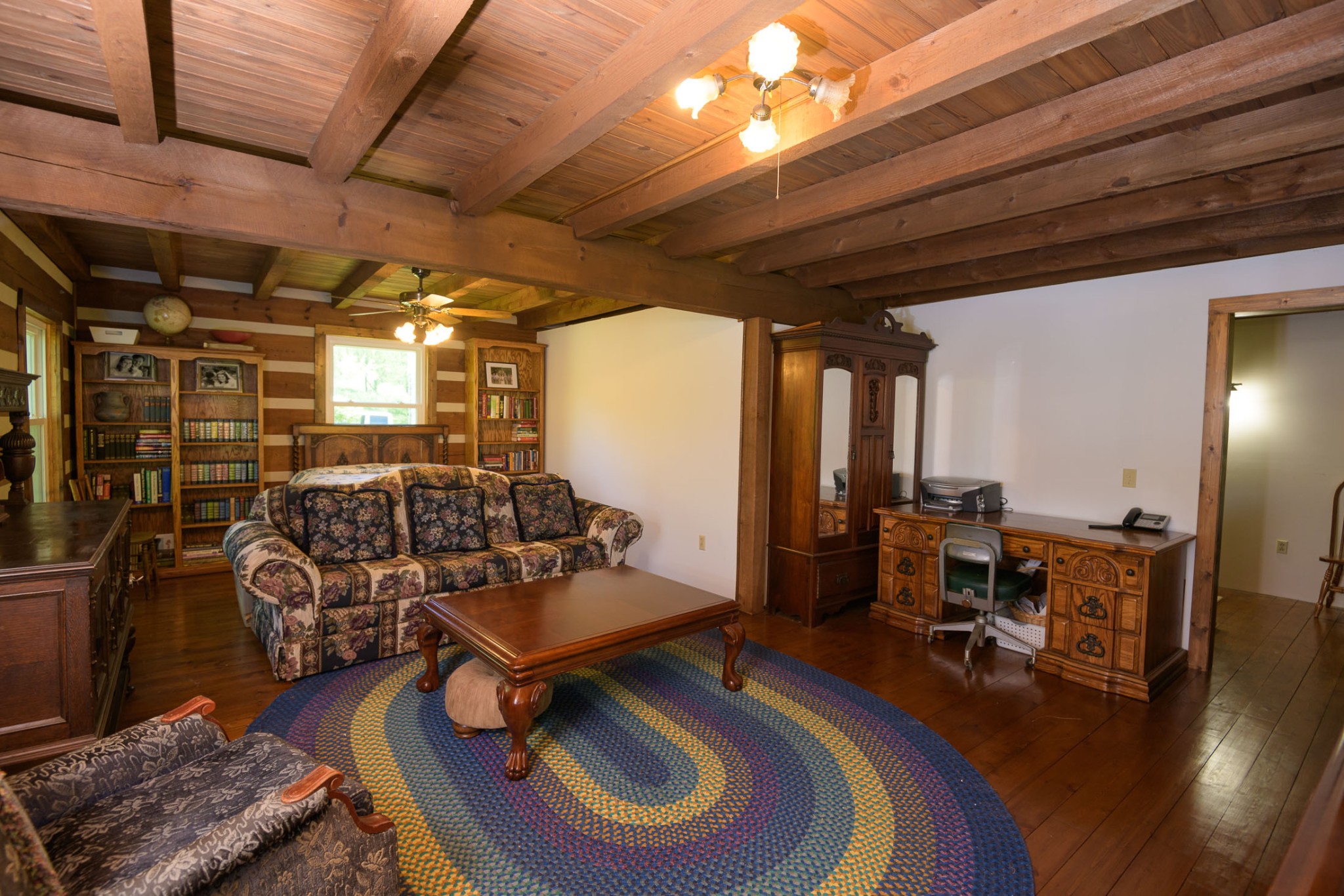 4496 Lower Helton Road Alexandria, TN 37012 - Photo 4 of 40 a room with gym equipment and wooden floor