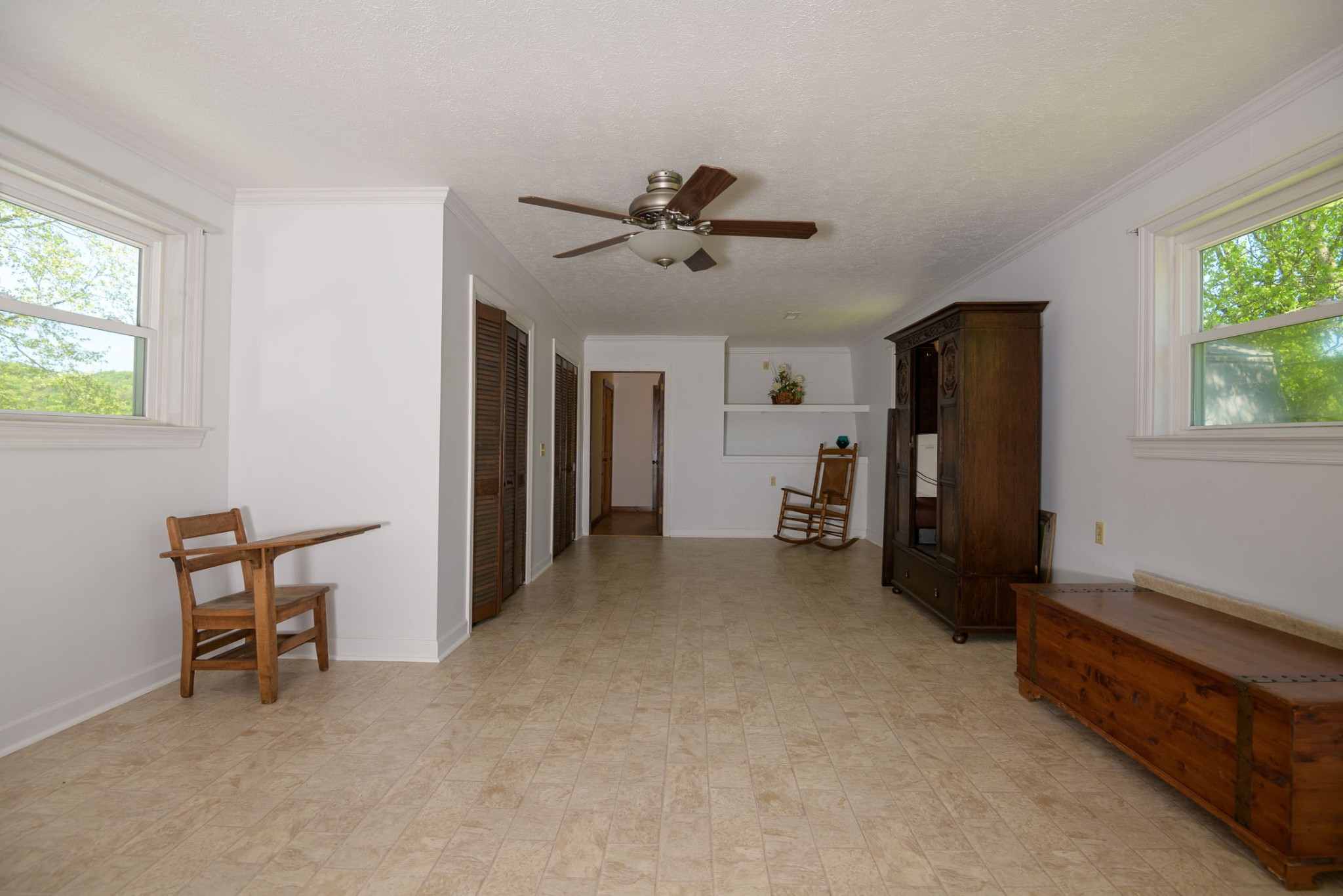 4496 Lower Helton Road Alexandria, TN 37012 - Photo 5 of 40 a view of a livingroom with furniture and a ceiling fan