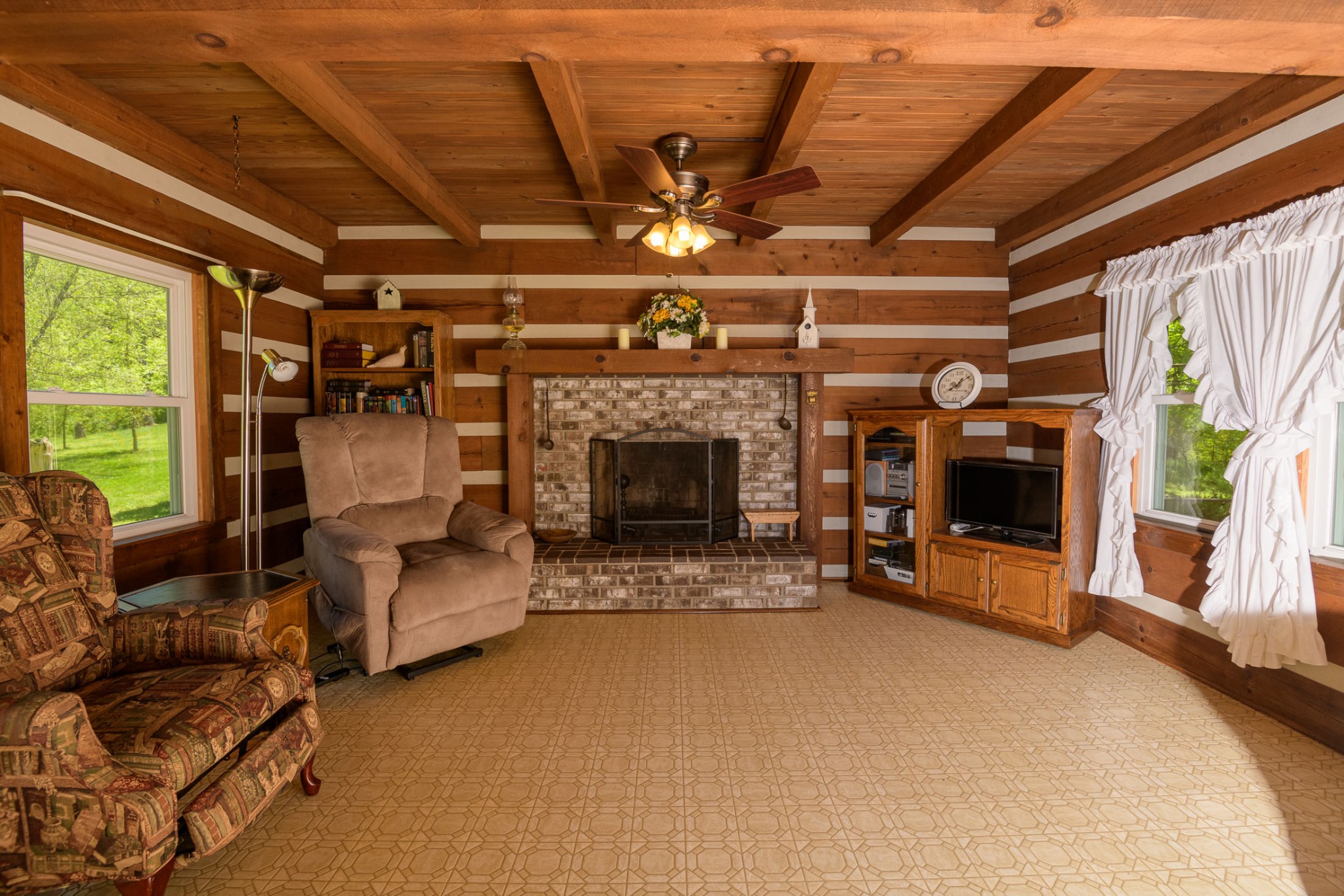 4496 Lower Helton Road Alexandria, TN 37012 - Photo 8 of 40 a living room with furniture and a fireplace