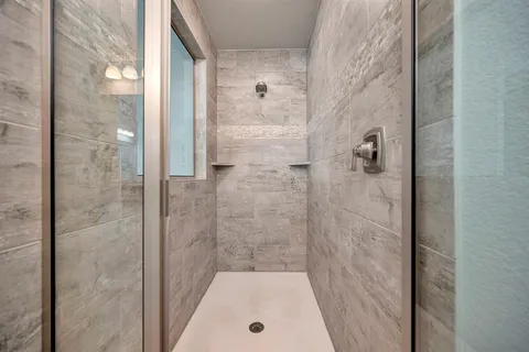 a view of a porch with seating space