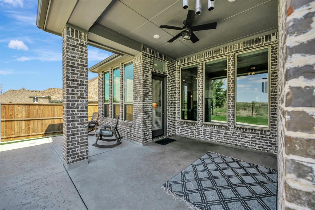 1129 Highpoint Way Roanoke, TX 76262 - Photo 22 of 26 a view of a porch with seating space