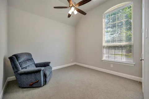 a view of livingroom with furniture and windows