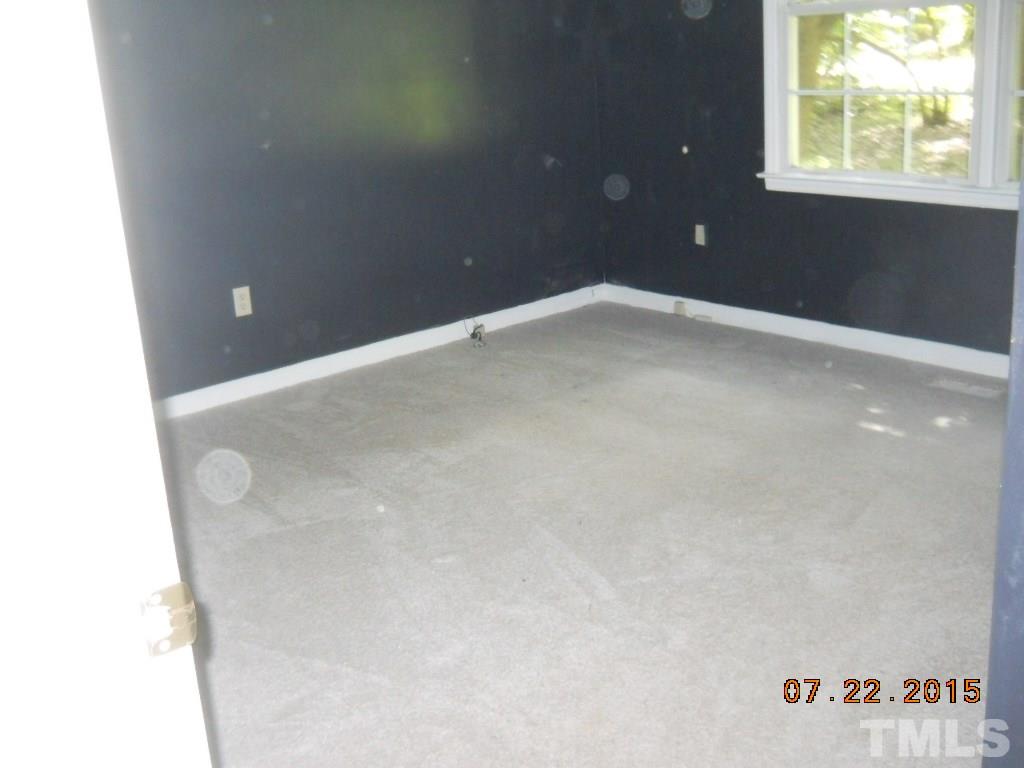 12201 North Roxboro Street Rougemont, NC 27572 - Photo 8 of 10 a view of an empty room