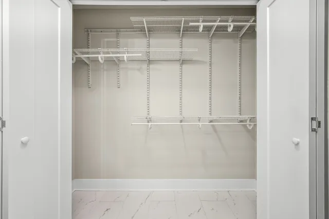 a view of a room with racks on the wall