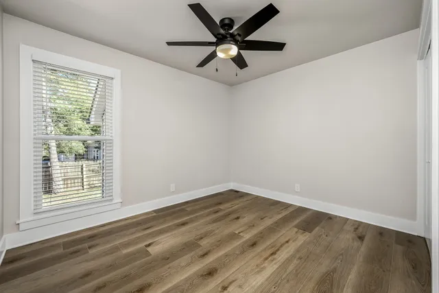 a view of an empty room with a window