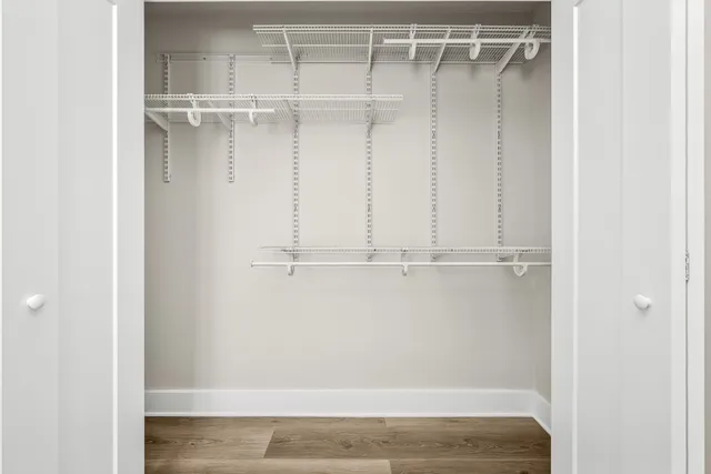 a view of a room with racks on the wall