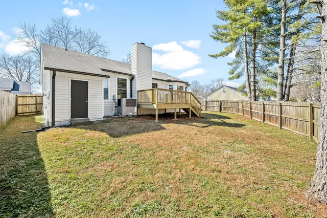 a house with trees in front of it