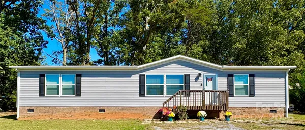 a view of a house with a swimming pool