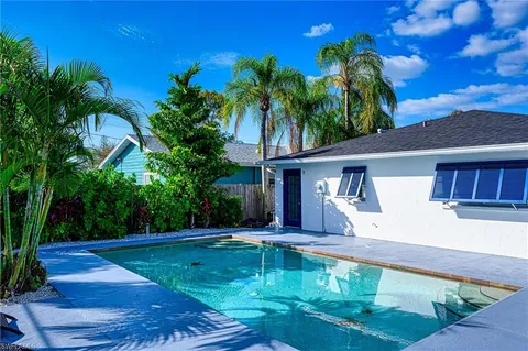 a view of a house with swimming pool