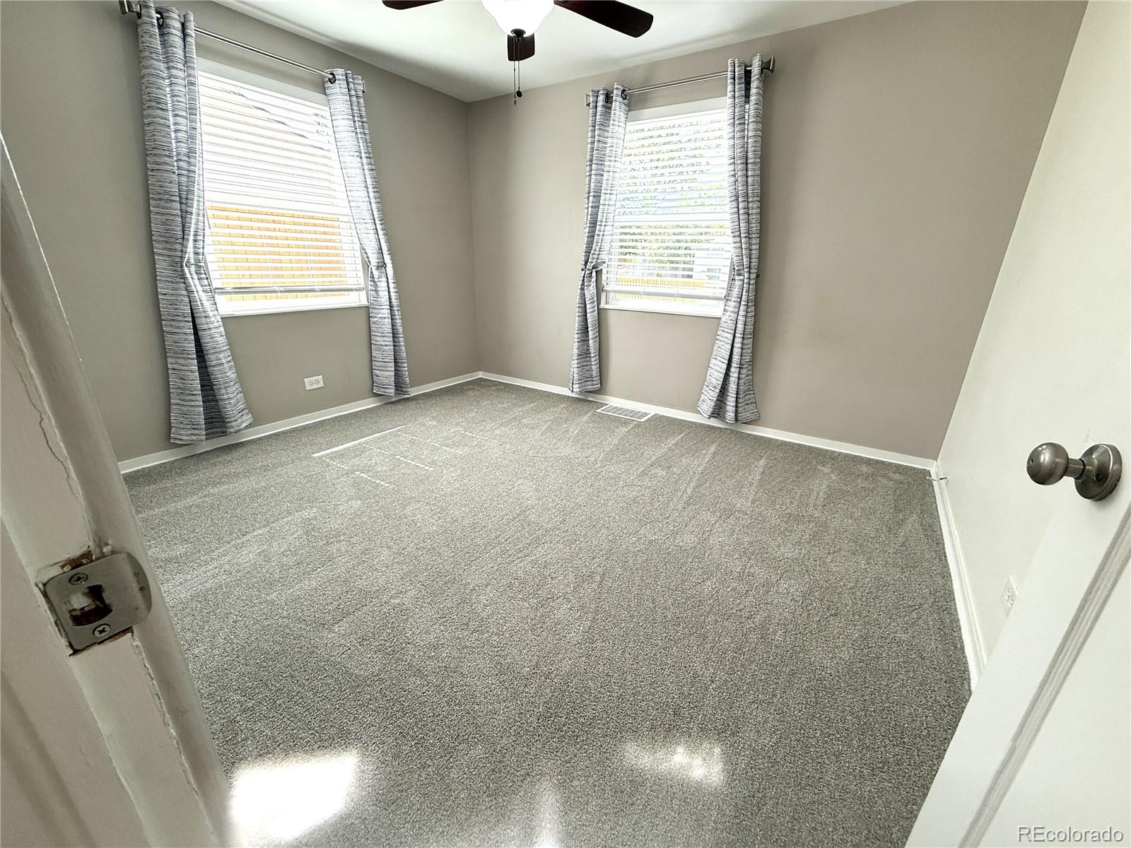 1920 Willow Street Denver, CO 80220 - Photo 11 of 41 a view of an empty room with a window