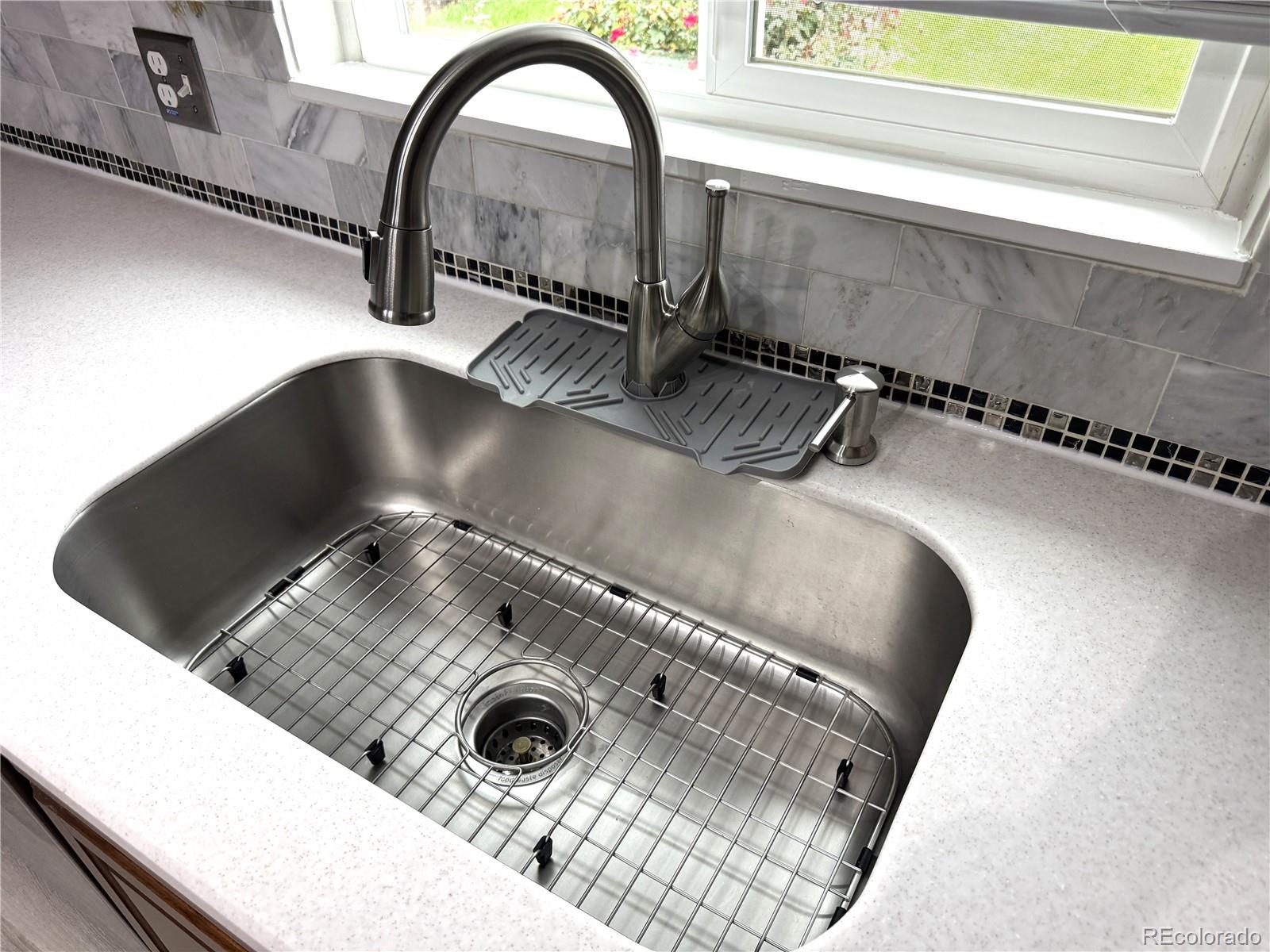 1920 Willow Street Denver, CO 80220 - Photo 23 of 41 a close view of a stove in the kitchen