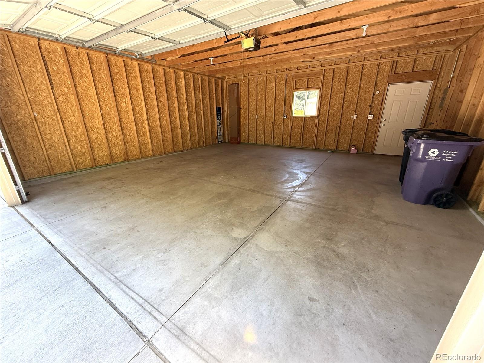 1920 Willow Street Denver, CO 80220 - Photo 31 of 41 a view of a room with wooden walls
