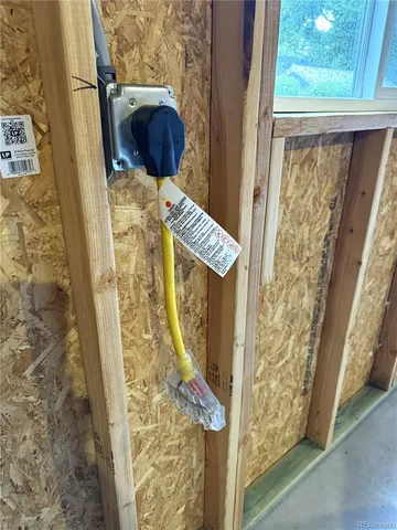 a bathroom with a shower and a mirror