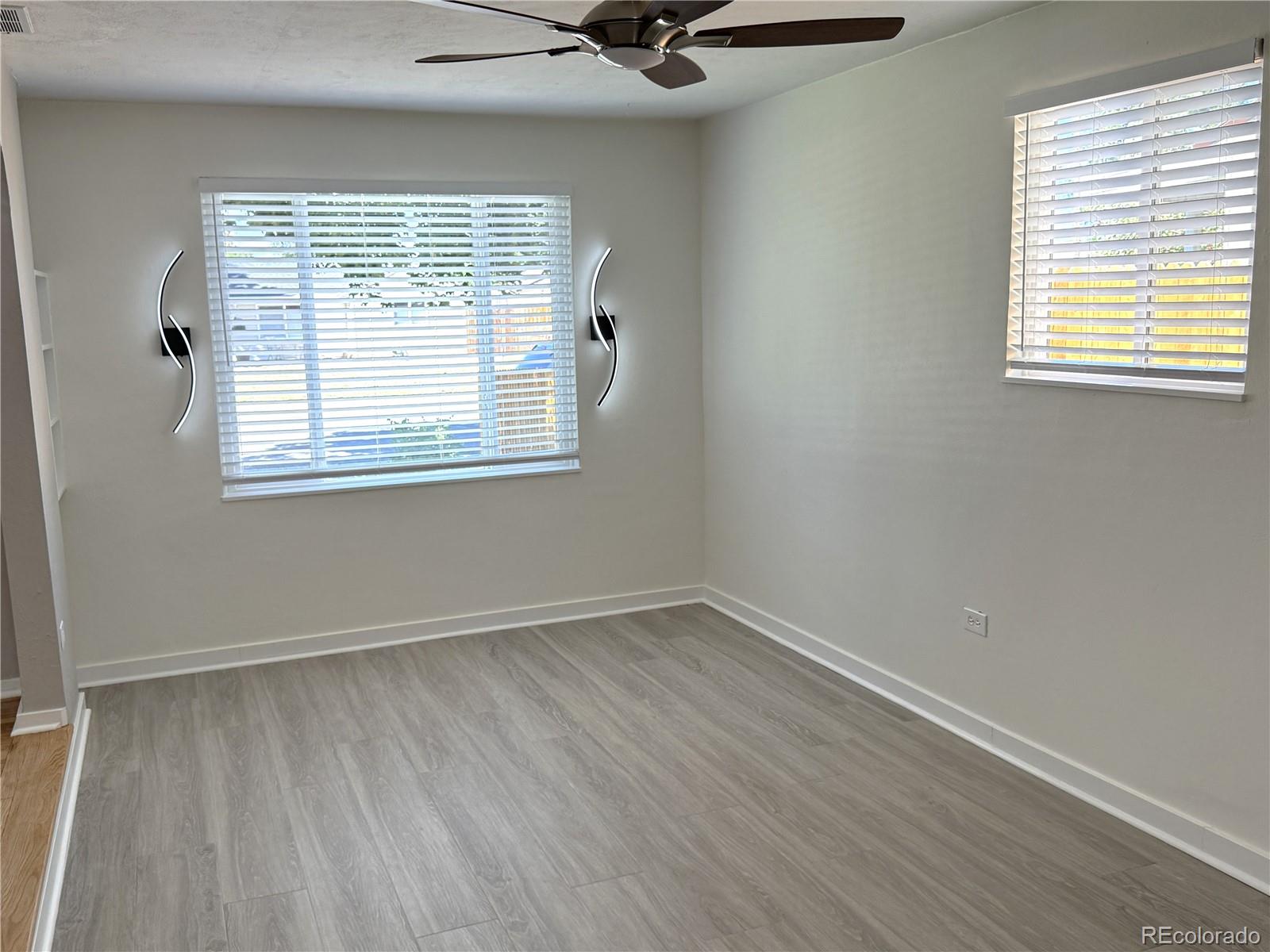 1920 Willow Street Denver, CO 80220 - Photo 8 of 41 an empty room with a window