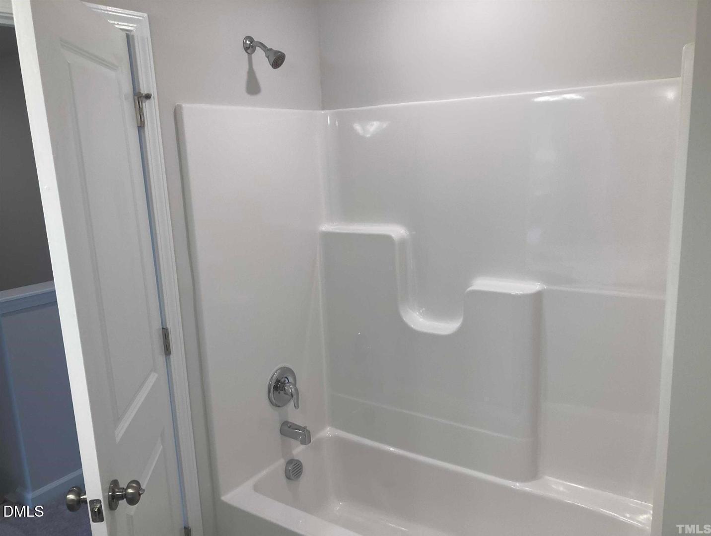 1823 Caen Street Raleigh, NC 27610 - Photo 9 of 13 a bathroom with a shower