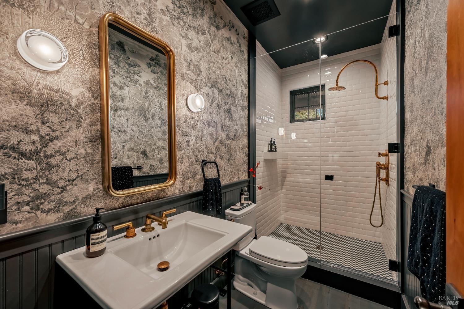 21831 Schellville Road Sonoma, CA 95476 - Photo 11 of 30 a bathroom with a sink mirror toilet and shower