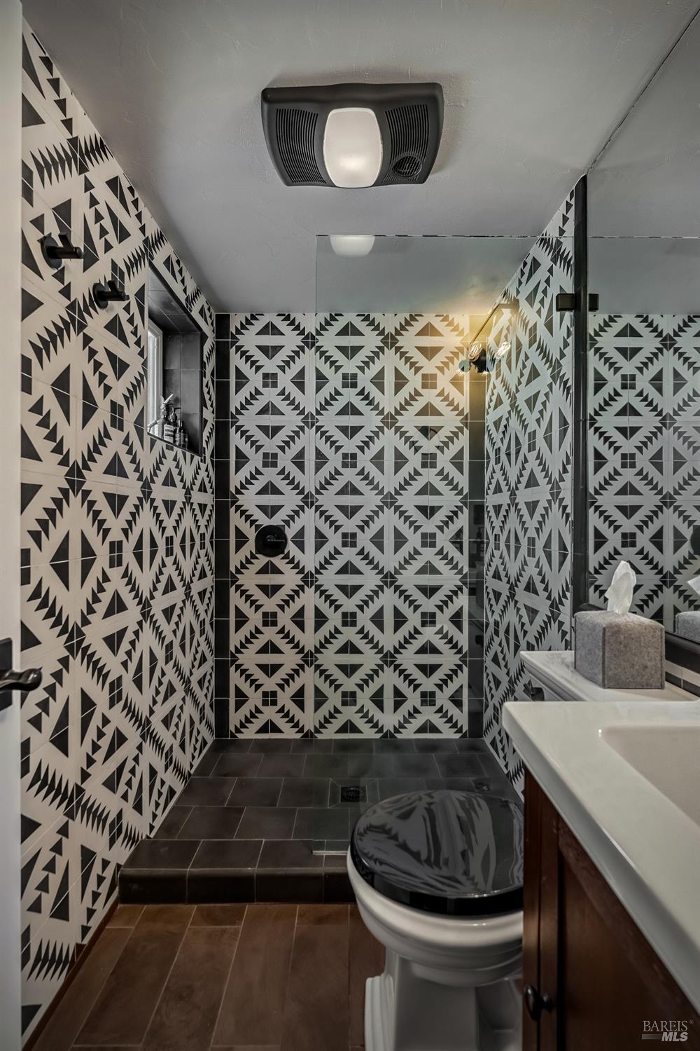 21831 Schellville Road Sonoma, CA 95476 - Photo 21 of 30 a bathroom with a sink and a toilet