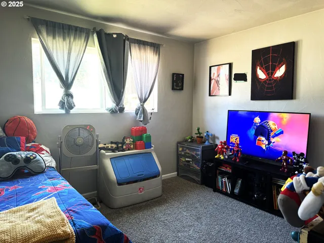 a view of a room with a wall painting