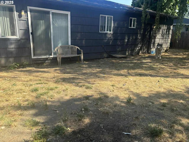 a view of pool table and chairs
