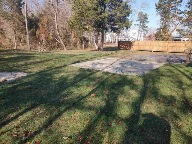 a view of outdoor space with trees all around