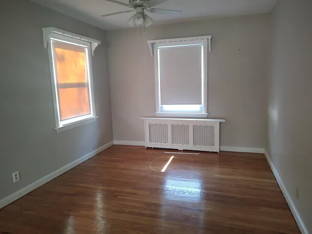 a kitchen with a sink a stove and cabinets