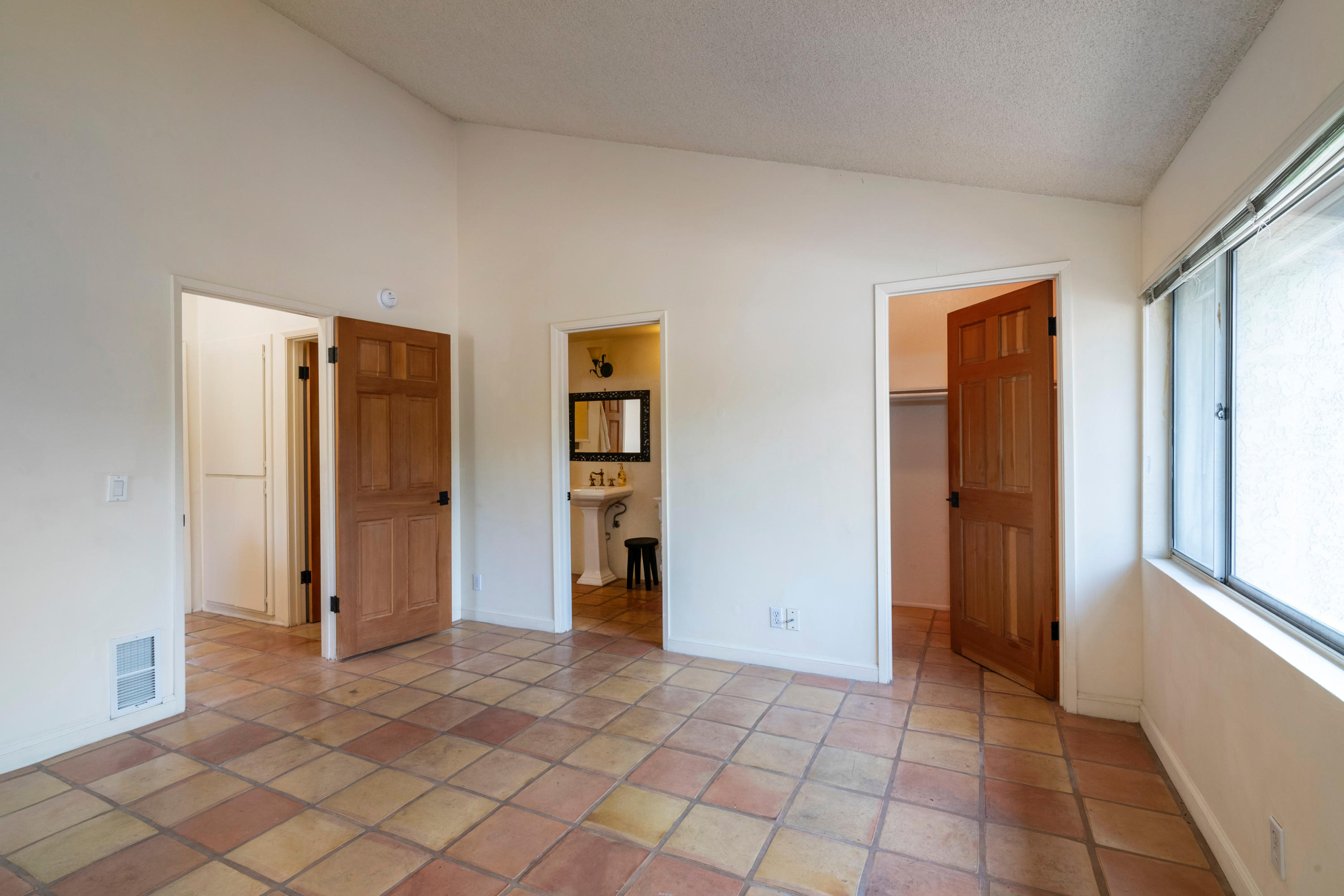 415 West Gutierrez Street, Unit 16 Santa Barbara, CA 93101 - Photo 10 of 12 an empty room with closet