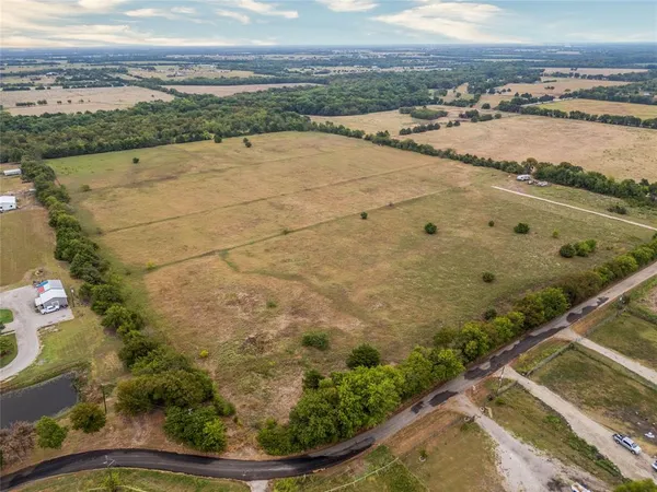 an aerial view of beach and city
