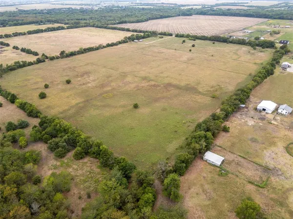 a view of a lake with a city