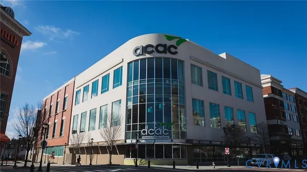 a view of swimming pool with outdoor seating