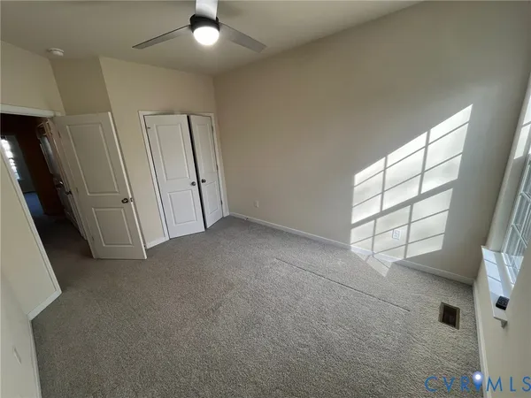 a view of a hallway with entryway