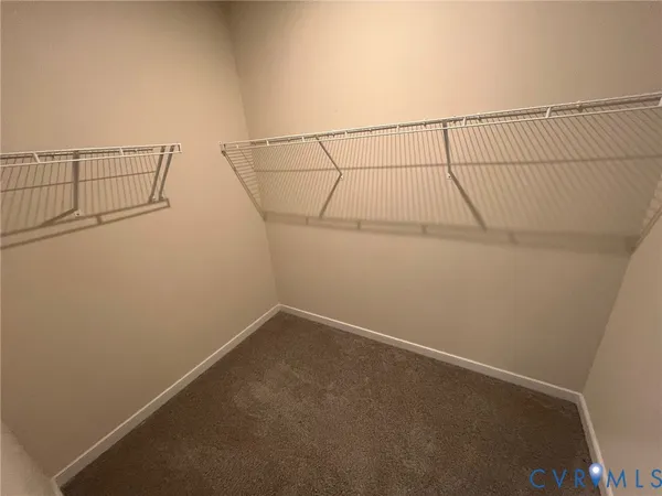 a view of a room with racks on the wall