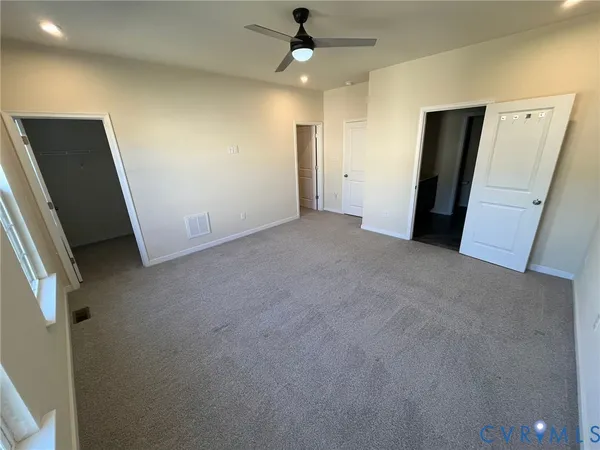 a view of a room with racks on the wall