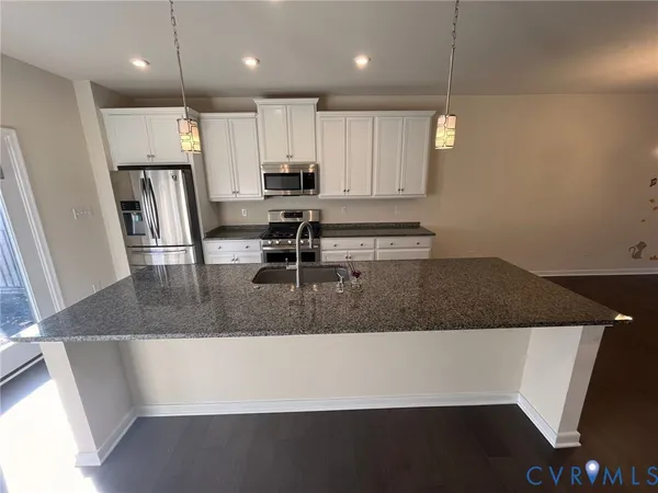 a view of balcony and wooden floor